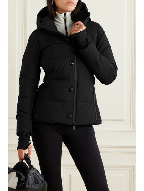 "black puffer jacket with a fitted waist"