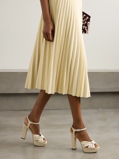 "Open-toe block heels with platforms in neutral colors but not black"