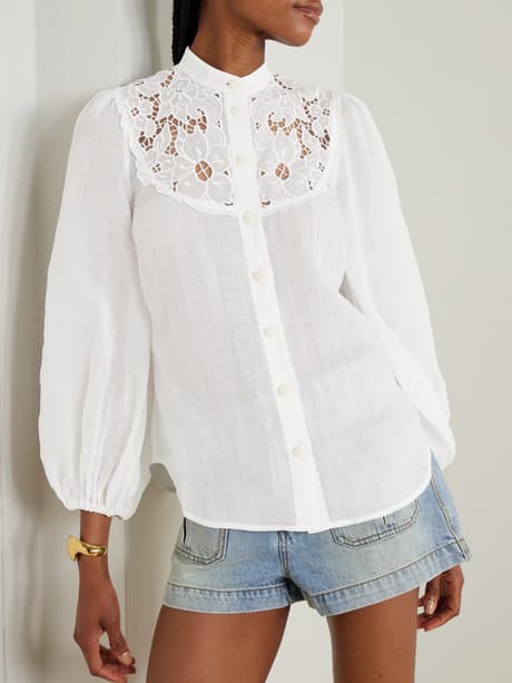 "Romantic white blouse with bow details or lace"